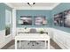 Bright home office with white desk, decorative lamps, and tranquil artwork at 154 Royal Cainhoy Way, Huger, SC 29450