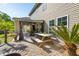 Backyard featuring a patio and picnic table, perfect for outdoor dining and relaxation at 1606 Stovall Ct, Johns Island, SC 29455