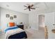Bright bedroom with carpet, ceiling fan, single bed, and adjacent doorway at 1606 Stovall Ct, Johns Island, SC 29455