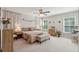 Tranquil bedroom with bright natural light, modern decor and a plush rug at 1606 Stovall Ct, Johns Island, SC 29455