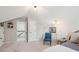 Bright attic bedroom with a sloped ceiling and an adjacent doorway at 1606 Stovall Ct, Johns Island, SC 29455