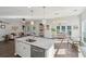 Open kitchen featuring granite countertops, a stainless steel dishwasher, and seamless flow to dining and living areas at 1606 Stovall Ct, Johns Island, SC 29455