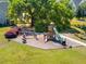 Community playground with slides, swings, and a climbing structure surrounded by green space, promoting fun and active lifestyles at 1606 Stovall Ct, Johns Island, SC 29455