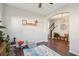 Bright playroom with hardwood floors, ample natural light, and a colorful rug perfect for ' activities at 1606 Stovall Ct, Johns Island, SC 29455