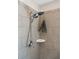 Shower with modern tile and shower head, complete with a corner shelf for your essentials at 1606 Stovall Ct, Johns Island, SC 29455