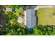 Aerial view showcasing backyard with sand area, patio, and well-maintained roof at 1621 Wannamaker Ave, Summerville, SC 29485