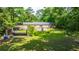 The expansive backyard features a detached garage and plenty of green space at 1621 Wannamaker Ave, Summerville, SC 29485