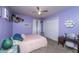 This bedroom features charming decor and a neutral color scheme at 1621 Wannamaker Ave, Summerville, SC 29485
