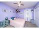 This bedroom features charming decor and a neutral color scheme at 1621 Wannamaker Ave, Summerville, SC 29485