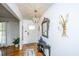 Inviting foyer features stylish decor, wood flooring, and a welcoming ambiance for guests at 1621 Wannamaker Ave, Summerville, SC 29485
