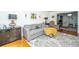 Inviting living room showcasing hardwood floors, a comfortable sofa, and tasteful decor, perfect for relaxation at 1621 Wannamaker Ave, Summerville, SC 29485