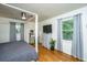 This bedroom features natural light and hardwood floors at 1621 Wannamaker Ave, Summerville, SC 29485