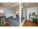 This spacious main bedroom features a four-poster bed and updated fixtures at 1621 Wannamaker Ave, Summerville, SC 29485