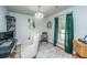Bright office with hardwood floors, stylish decor, and natural light streaming through the window at 1621 Wannamaker Ave, Summerville, SC 29485