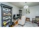 Well-appointed office space featuring a desk, shelving, and comfortable seating, creating a productive environment at 1621 Wannamaker Ave, Summerville, SC 29485