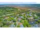 Panoramic aerial of a coastal neighborhood offering lovely views of a salt marsh and highway at 1650 Long Grove Dr, Mount Pleasant, SC 29464