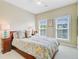 Bright bedroom with hardwood floors, ceiling fan, fresh paint and natural light at 1650 Long Grove Dr, Mount Pleasant, SC 29464