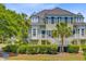 Charming townhome featuring a private entrance, well-manicured landscaping, and a light, neutral color palette at 1650 Long Grove Dr, Mount Pleasant, SC 29464