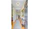 Inviting foyer featuring hardwood floors, elegant lighting, and tasteful decor creating a warm welcome at 1650 Long Grove Dr, Mount Pleasant, SC 29464
