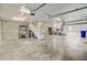 Spacious two-story garage with shelving and ample room for storage at 1650 Long Grove Dr, Mount Pleasant, SC 29464