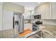 Well-equipped kitchen with granite counters, stainless steel appliances, and ample cabinetry at 1650 Long Grove Dr, Mount Pleasant, SC 29464
