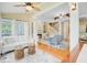 Open concept living room with hardwood floors, fireplace, and abundant natural light at 1650 Long Grove Dr, Mount Pleasant, SC 29464
