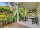 Cozy outdoor patio featuring comfortable seating and lush landscaping providing a private retreat at 1650 Long Grove Dr, Mount Pleasant, SC 29464