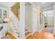 Beautiful staircase with wooden steps, leading to upper levels at 1650 Long Grove Dr, Mount Pleasant, SC 29464