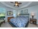Cozy bedroom features a tray ceiling with recessed lighting, creating a relaxing ambiance at 1823 Chauncys Ct, Mount Pleasant, SC 29466
