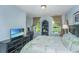 Bedroom with a lush green patterned comforter and outdoor view at 1823 Chauncys Ct, Mount Pleasant, SC 29466