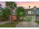 Charming townhomes with colorful exteriors, attached garages, and well-maintained landscaping at 1823 Chauncys Ct, Mount Pleasant, SC 29466