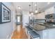 Modern kitchen featuring granite counters, white cabinets, and stainless appliances at 1823 Chauncys Ct, Mount Pleasant, SC 29466