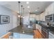 Modern kitchen with stainless steel appliances, white cabinets, and granite countertops at 1823 Chauncys Ct, Mount Pleasant, SC 29466