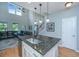 Open kitchen featuring granite countertops, stainless steel sink and pendant lighting at 1823 Chauncys Ct, Mount Pleasant, SC 29466