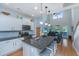 Modern kitchen features a large island with seating, stainless appliances, and abundant storage at 1823 Chauncys Ct, Mount Pleasant, SC 29466