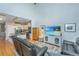 Open concept living room with modern kitchen, hardwood floors and comfortable seating at 1823 Chauncys Ct, Mount Pleasant, SC 29466
