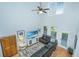 Spacious living room with high ceilings, a ceiling fan, and a beach-themed television display at 1823 Chauncys Ct, Mount Pleasant, SC 29466