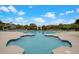 Community pool surrounded by lounge chairs, perfect for relaxation and leisure at 1823 Chauncys Ct, Mount Pleasant, SC 29466