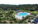 Aerial view of a community pool featuring ample seating, shade, and recreational space at 1823 Chauncys Ct, Mount Pleasant, SC 29466