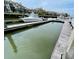 Boat docked on boat lift with water view and houses at 1880 Andell Bluff Blvd # F-3, Seabrook Island, SC 29455