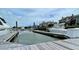 View of multiple boats docked in boat lifts next to waterfront houses at 1880 Andell Bluff Blvd # F-3, Seabrook Island, SC 29455