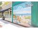 Whimsical beach-themed mural adding charm and local flavor to this commercial space at 1880 Andell Bluff Blvd # F-3, Seabrook Island, SC 29455