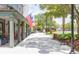 Inviting town center walkway with American flags and seating under charming covered walkways at 1880 Andell Bluff Blvd # F-3, Seabrook Island, SC 29455