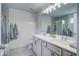 Elegant bathroom with double vanity, tub, and shower featuring modern fixtures at 1901 Toland Ct, Johns Island, SC 29455