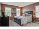 Warm bedroom with neutral tones, comfortable bedding, and ambient lighting at 1901 Toland Ct, Johns Island, SC 29455