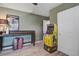 Versatile bonus room offering desk, decor, and a fun arcade game, adding a playful touch at 1901 Toland Ct, Johns Island, SC 29455