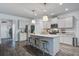 Well-equipped kitchen with a large center island, stainless steel appliances, and ample counter space at 1901 Toland Ct, Johns Island, SC 29455