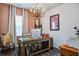 Bright home office with a rustic desk, modern decor and natural light at 1901 Toland Ct, Johns Island, SC 29455