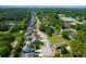 Scenic aerial view of the property nestled in a suburban neighborhood with mature trees at 2009 Terrabrook Ln, Charleston, SC 29412