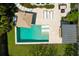 Aerial view of the backyard pool with pavers and a covered outdoor entertainment area at 2009 Terrabrook Ln, Charleston, SC 29412
